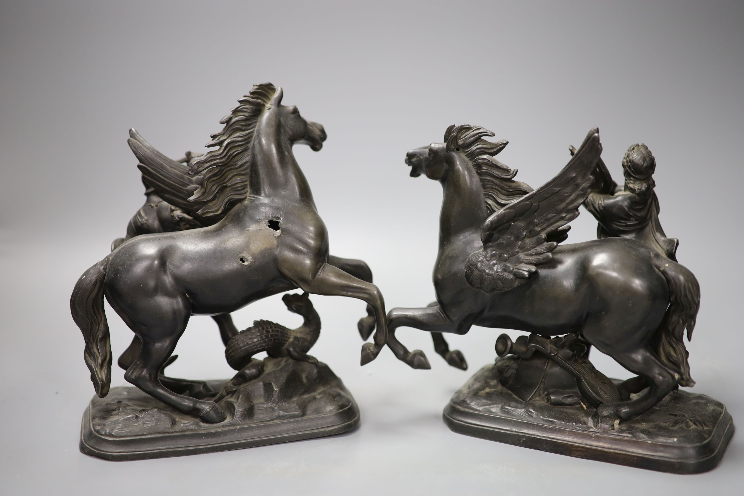 A pair of bronzed spelter groups of Perseus and Pegasus, height 20cm